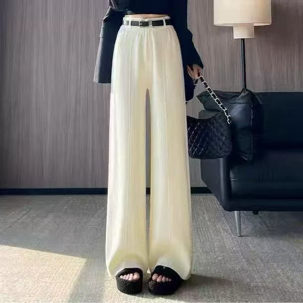 Pantalons femmes à jambes larges avec taille haute et finition soyeuse Chic & Stil