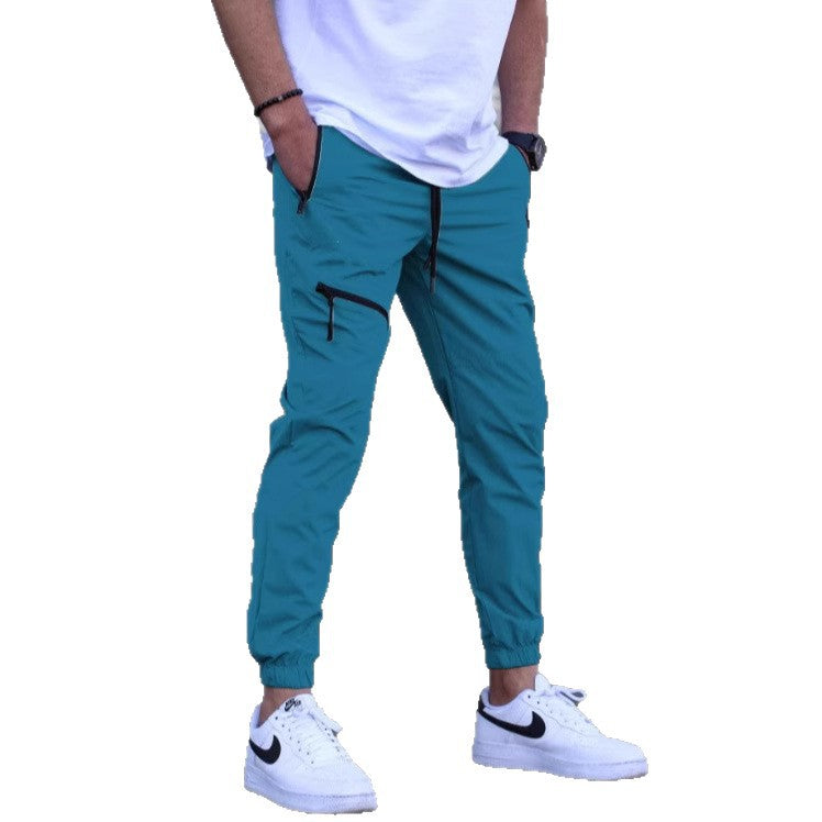 Light sporty pants for men with side zip pockets Lune London