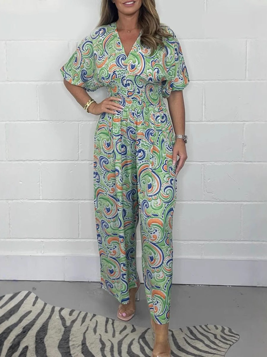Lady Fluid jumpsuit with elegant paisley pattern and Lune London cinching