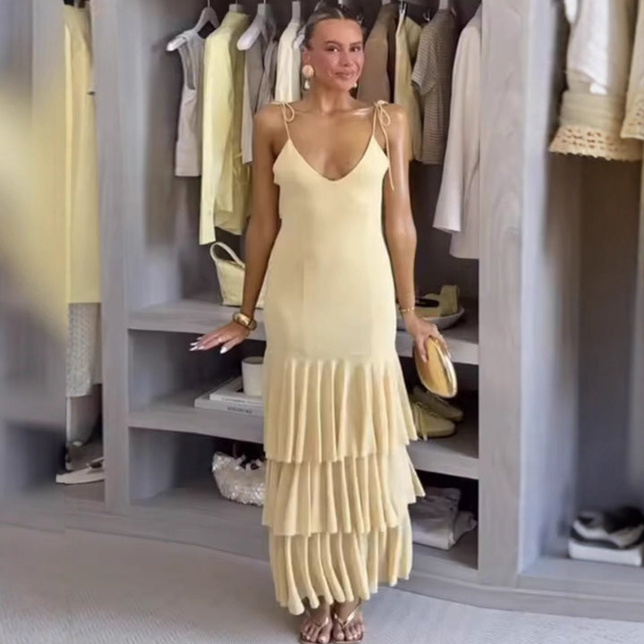 Elegant maxi dress for ladies with flowing skirt and delicate spaghetti straps Lune London