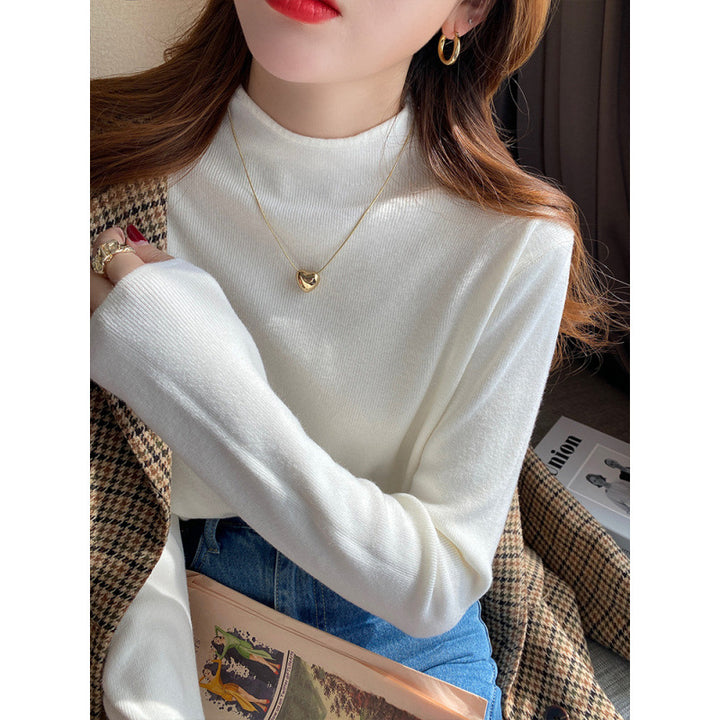 Pull-over tricoté pour femmes avec col montant et matériau doux Chic & Stil