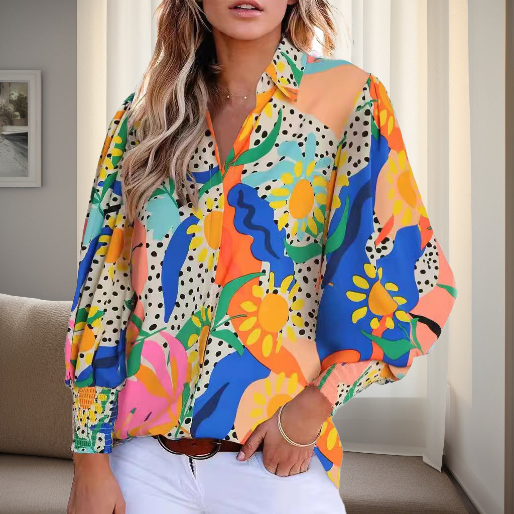Shirt blouse for women with a vibrant floral design featuring off-shoulder and elastic cuffs Lune London