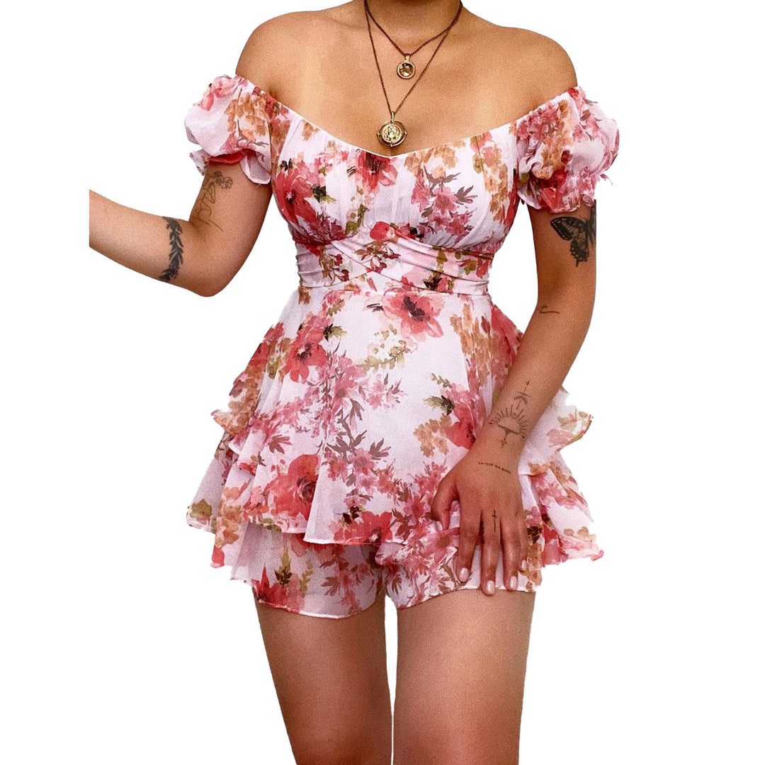 Women's short sleeve overall with romantic floral pattern and flowing cut