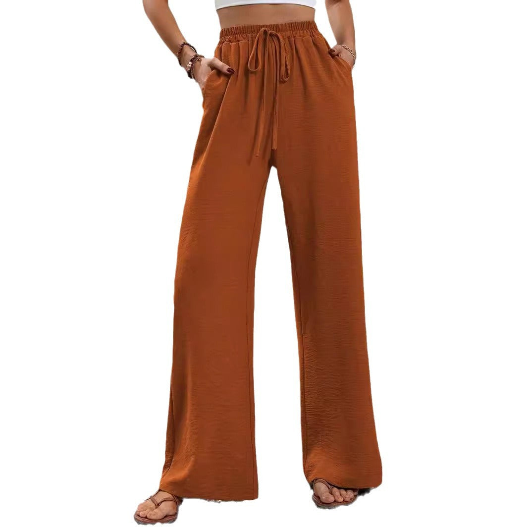 Pantalons larges d'été pour femmes avec taille élastique et poches latérales pratiques Chic & Stil