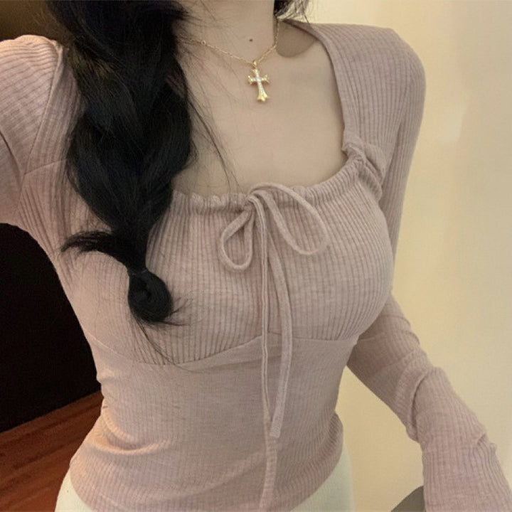 Women's long-sleeved top with decorative ruffles and ties Chic & Stil