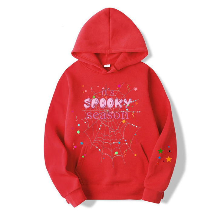 Women cozy hoodie with graphic Halloween design Chic & Stil