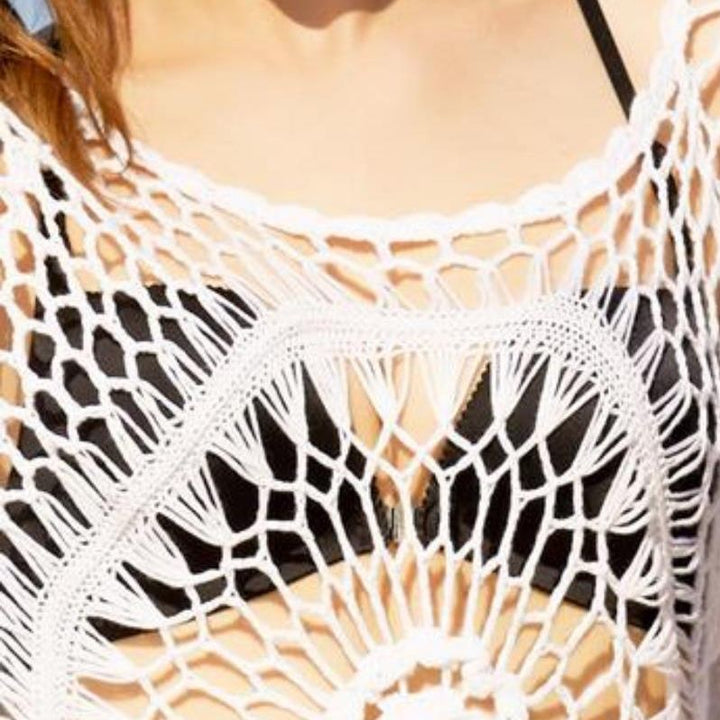 Ladies oversized crochet with open stitches and fringes Lune London