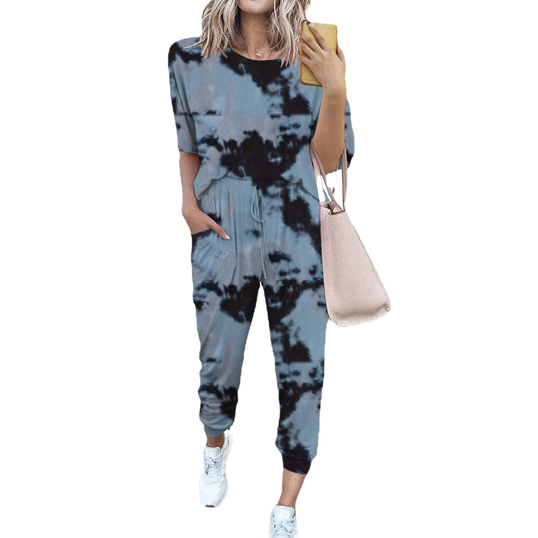 Ladies lightweight casual jumpsuit with a striking tie-dye pattern and practical pockets Lune London