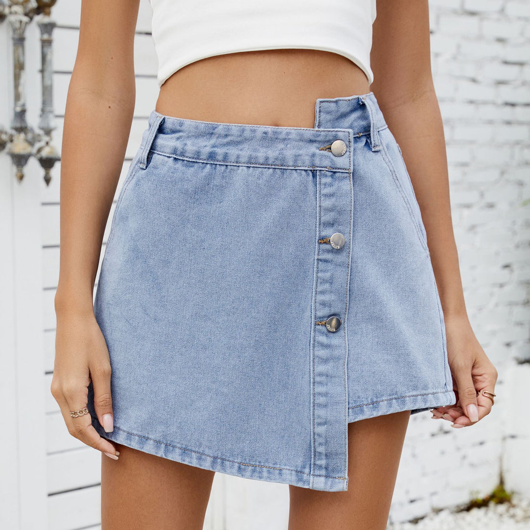 Denim dress for ladies with asymmetric hem and practical button details Lune London