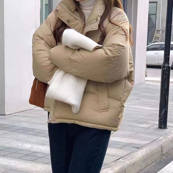 Quilted short sleeve jacket for women with a high collar and relaxed fit Lune London