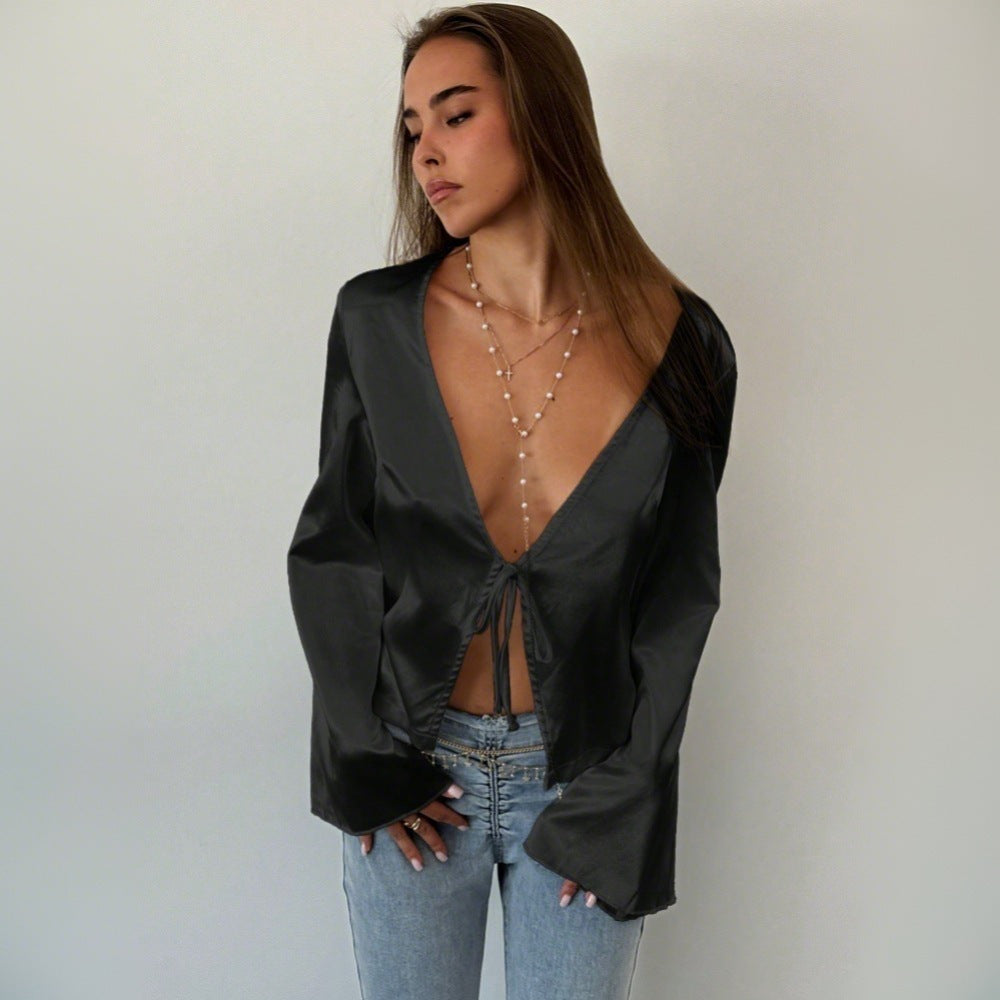 Elegant blouse for women with a deep V neckline and a casual knot detail Chic & Stil