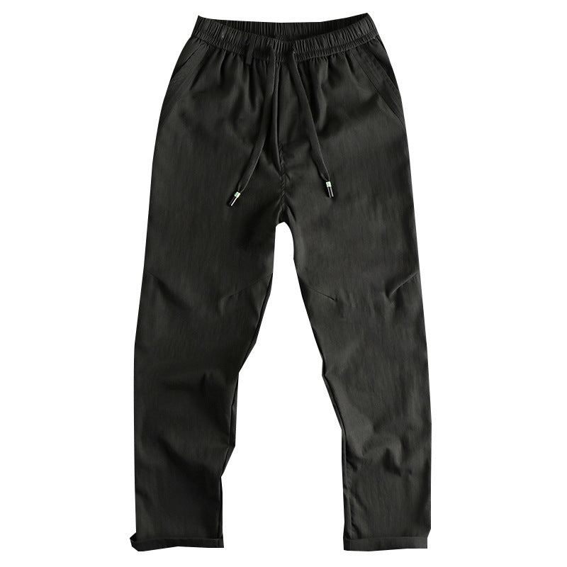 Men's athletic leisure pants with elastic waistband and practical drawstring Lune London
