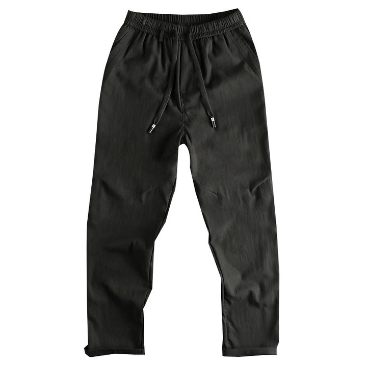 Men's athletic leisure pants with elastic waistband and practical drawstring Lune London
