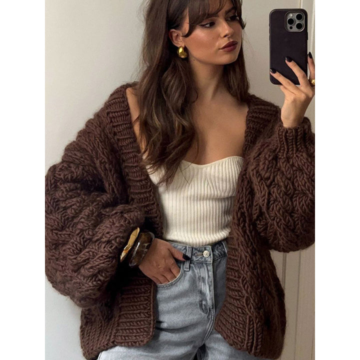 Thick knit jacket for women with an oversized fit and elegant braided patterns Lune London
