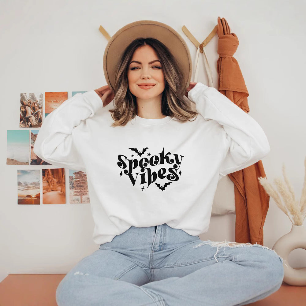 Sweat à capuche pour femmes avec un design Halloween ludique et une coupe confortable Chic & Stil