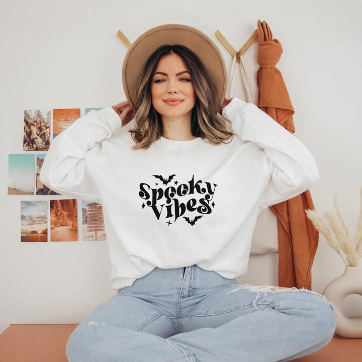Sweat à capuche pour femmes avec un design Halloween ludique et une coupe confortable Chic & Stil