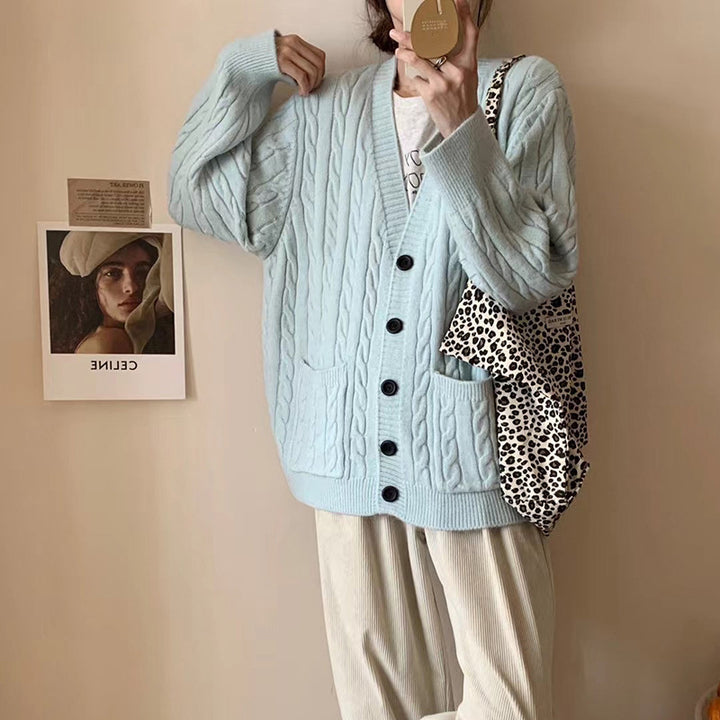 Ladies chunky knit vest with clover pattern and practical pockets Lune London