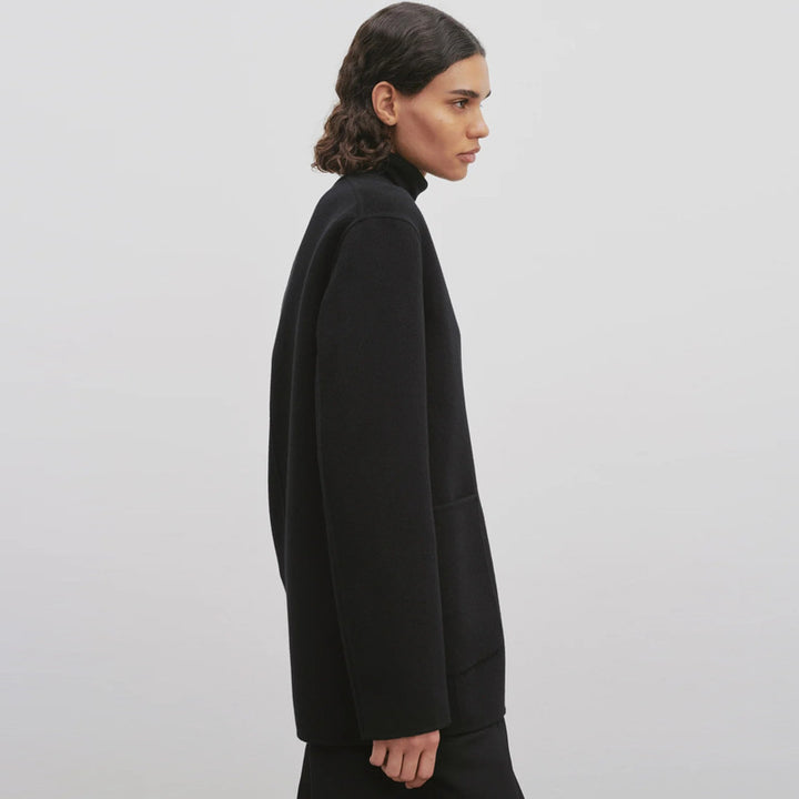 Blazer tricoté élégant pour femmes avec grands revers et poches pratiques Chic & Stil