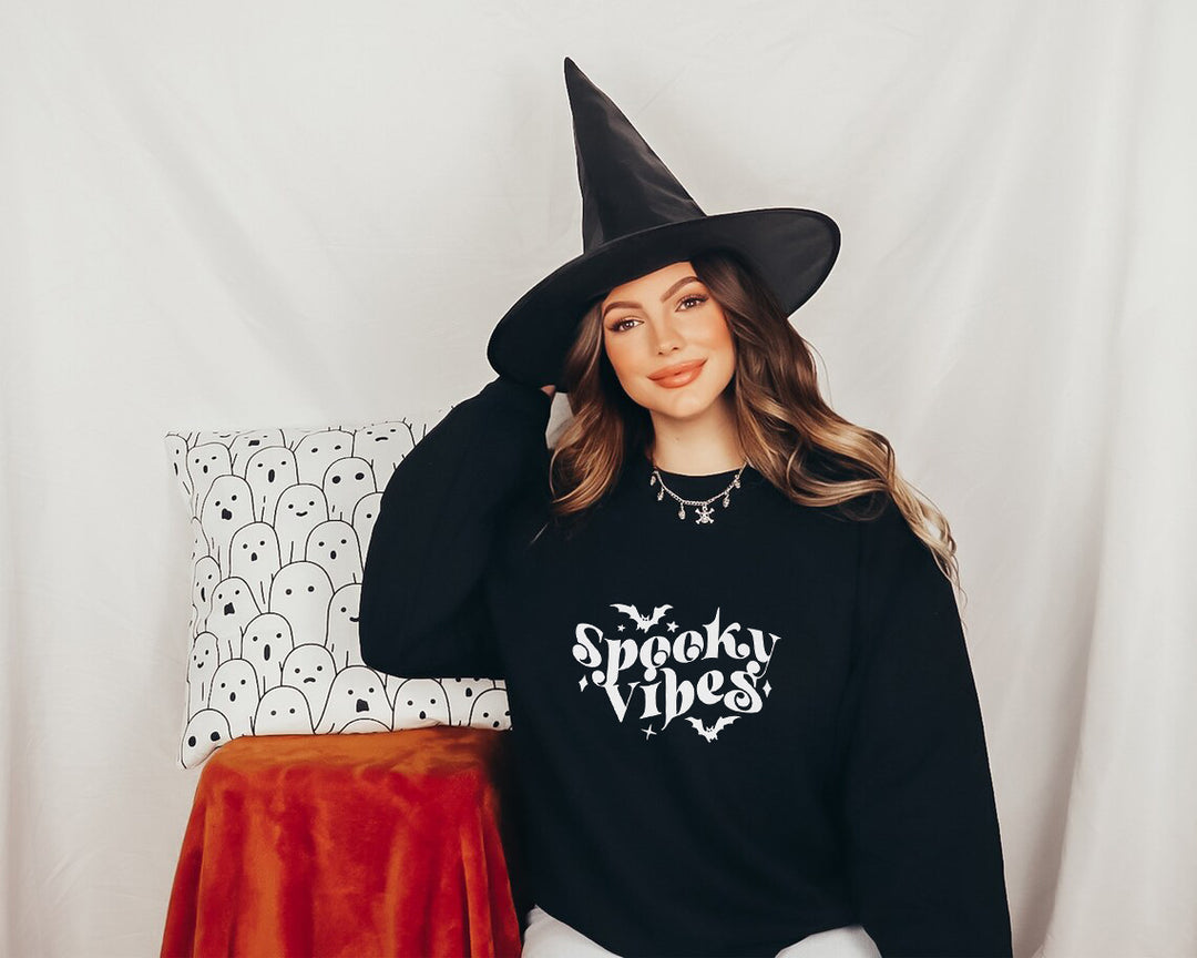 Sweat à capuche pour femmes avec un design Halloween ludique et une coupe confortable Chic & Stil