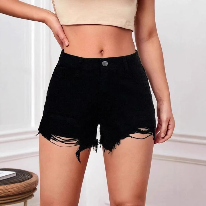 Women's fashionable destroyed denim shorts with frayed hem Lune London