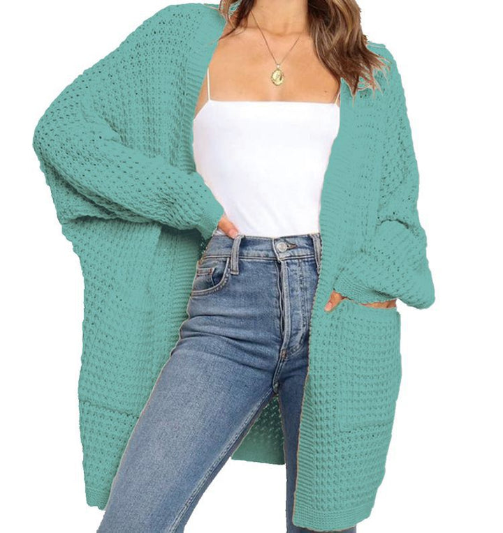 Thick knit jacket for women with a relaxed fit and practical pockets Lune London