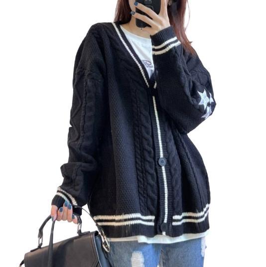 Thick knit jacket for women with a unique cable structure and decorative stars Lune London
