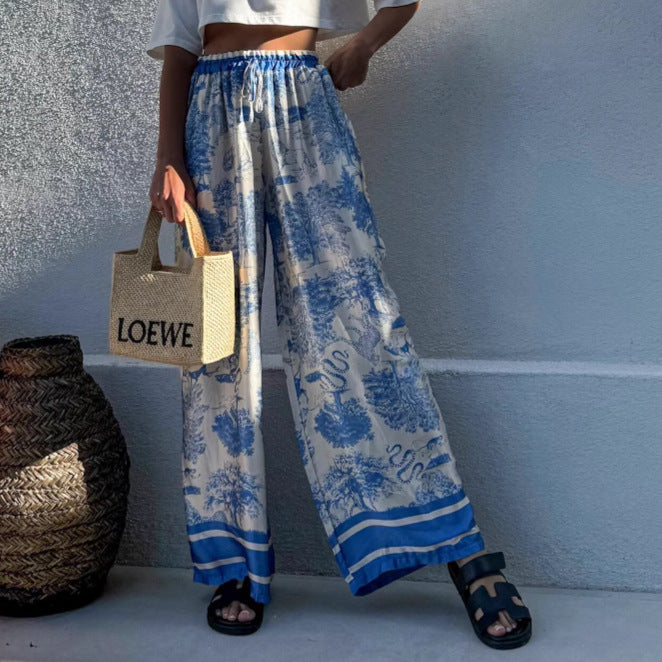 Wide palazzo pants for Damen with floral pattern and elastic waistband Lune London