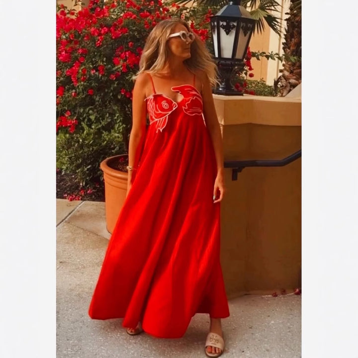 Maxi dress for women with a playful fishnet design and adjustable spaghetti straps Lune London