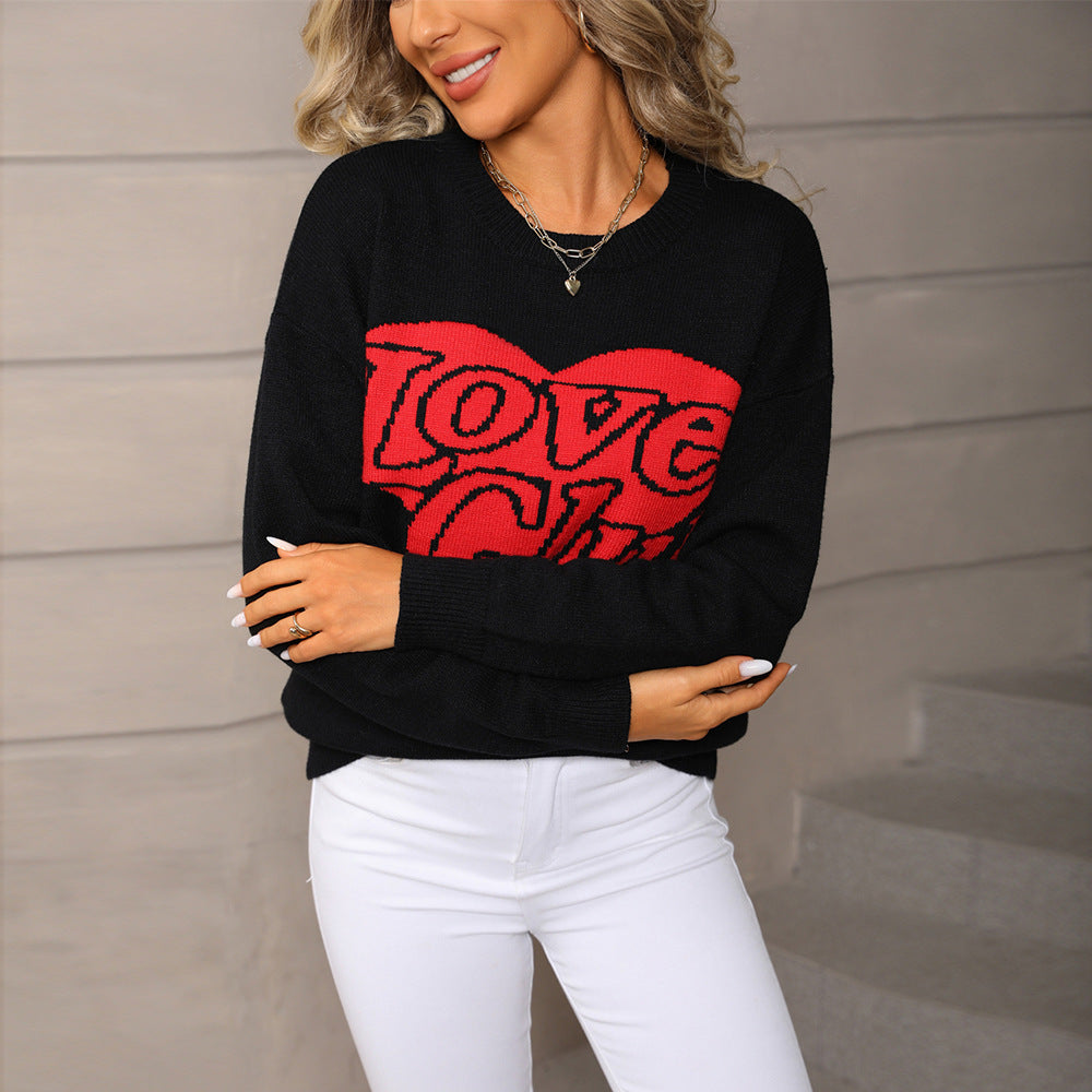 Pull pour femmes avec une inscription frappante et une coupe généreuse Chic & Stil
