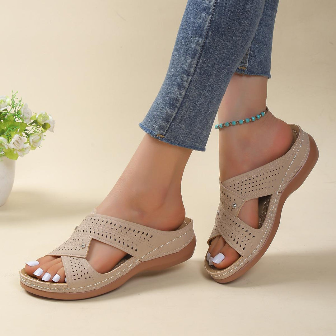 Comfortable and breathable sandals for women with stylish perforations Lune London