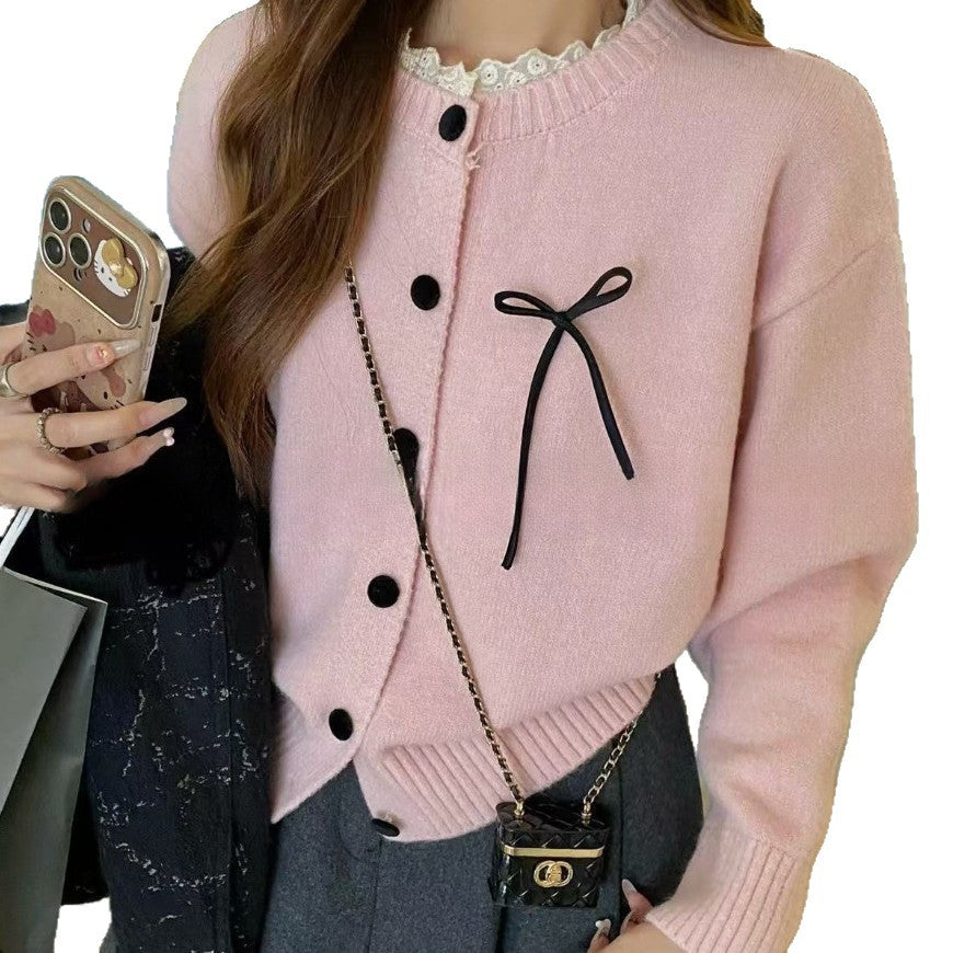 Ladies comfortable cardigan with decorative buttons and chic knot accents