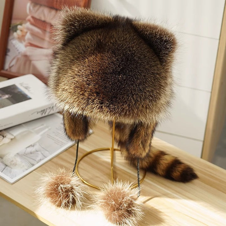 Ladies fashionable fur cap with ear protection and pom-poms Lune London