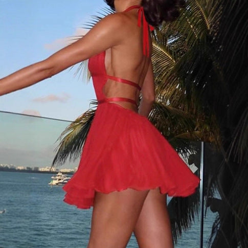 Elegant women's mini dress with deep V-neckline and refined ruffle details Lune London