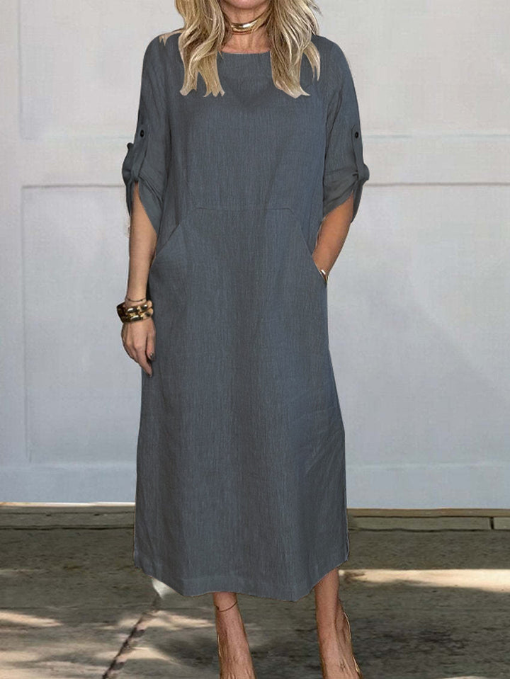 Airy midi dress for women with practical pockets and roll-up sleeves Lune London