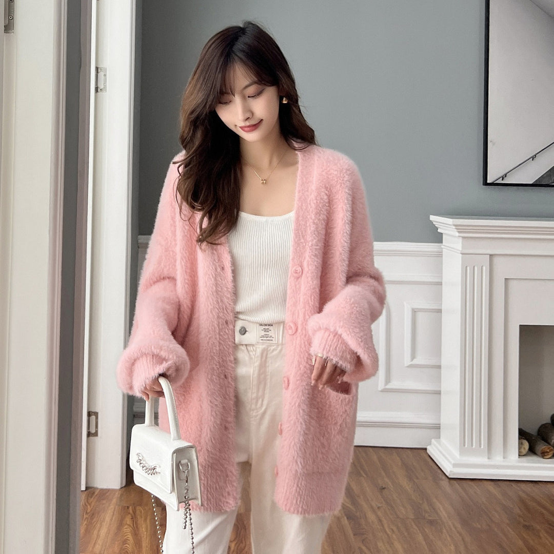 Cardigan moelleux pour femmes avec poches et larges revers Chic & Stil
