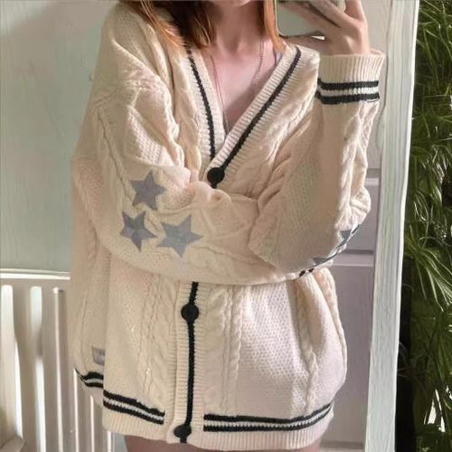 Thick knit jacket for women with a unique cable structure and decorative stars Lune London