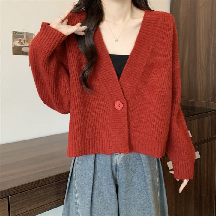 Cardigan tendance femme avec décolleté en V profond et fermeture à boutons Chic & Stil