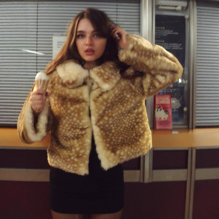 Ladies faux fur coat with wide collar and pretty ruffles Lune London