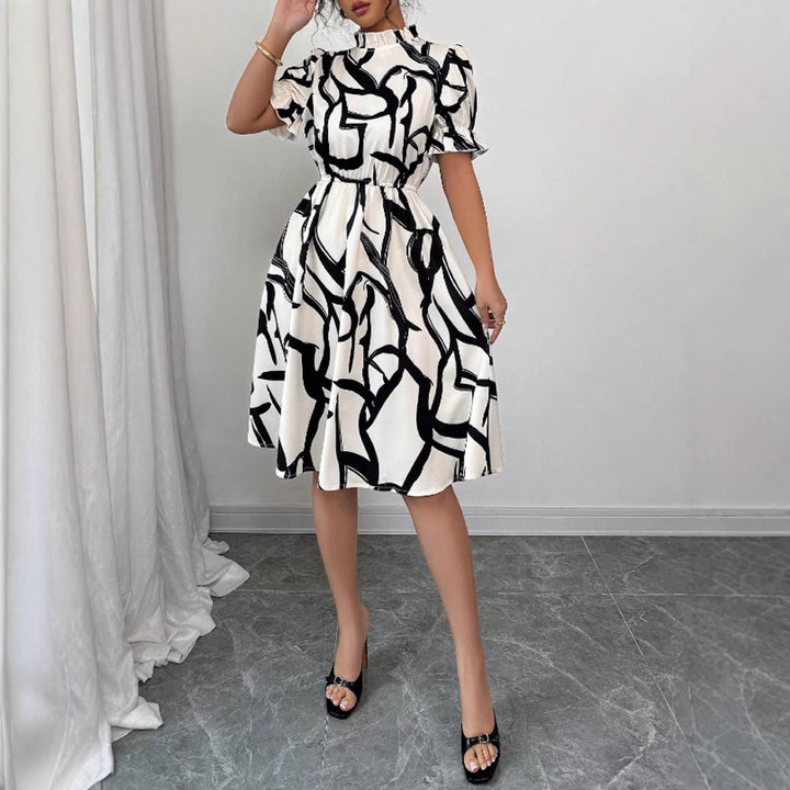 Robe midi élégante pour femmes avec motif de plantes stylé et taille élastique Chic & Stil