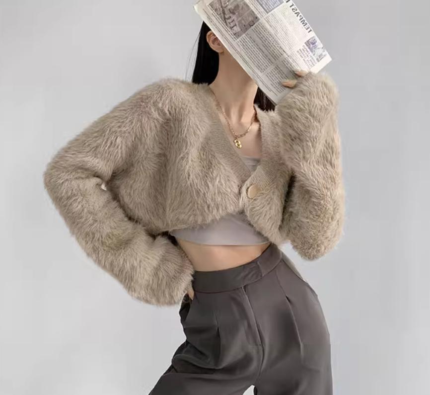 Cropped knitted jacket for women with voluminous sleeves and button detail Lune London