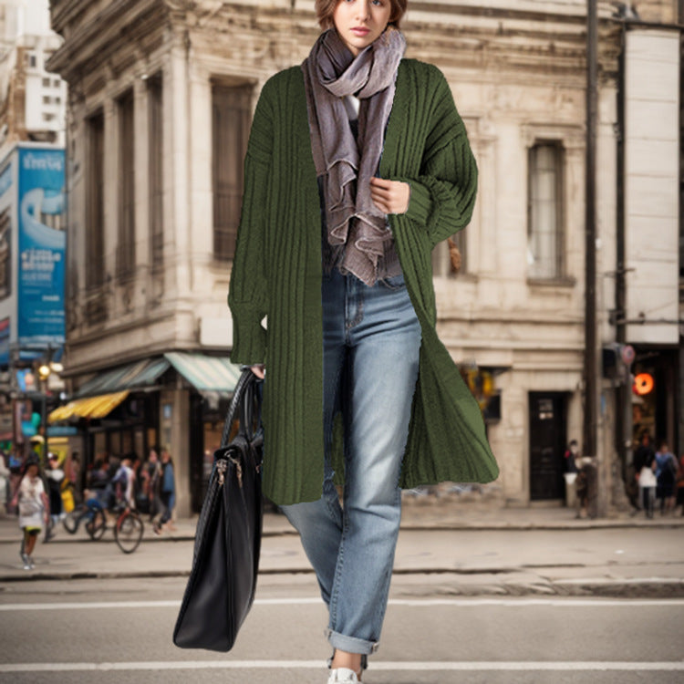 Long knit coat for women with a relaxed cut, deep pockets, and soft touch Lune London