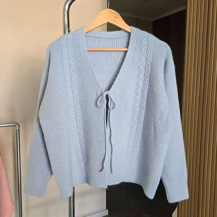 Women’s knit jacket with cable pattern and decorative drawstring Lune London