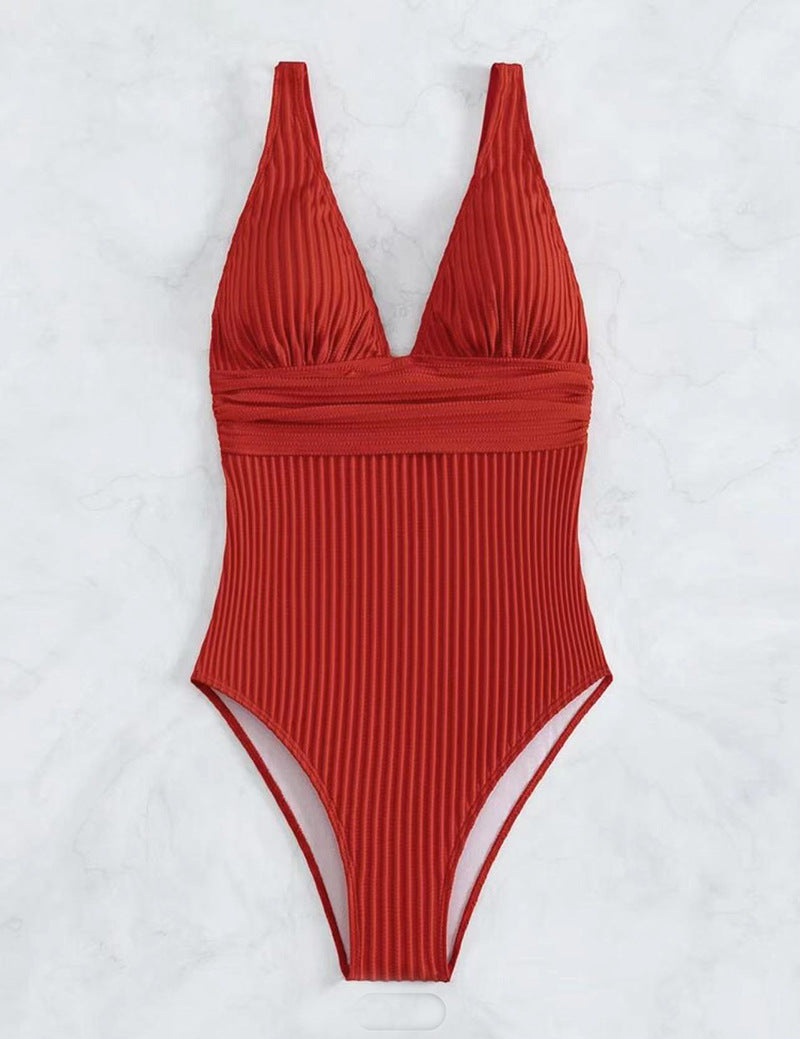One-piece swimsuit for women with a refined ribbed design and a deep V neckline Lune London
