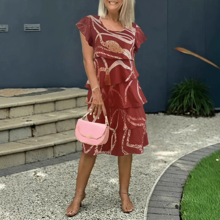 Fluid wrap dress for women with an elegant overlay and a unique pattern Lune London