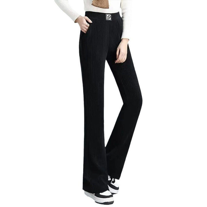 Women's high-waisted flared trousers with stylish ribbed design and elastic waistband