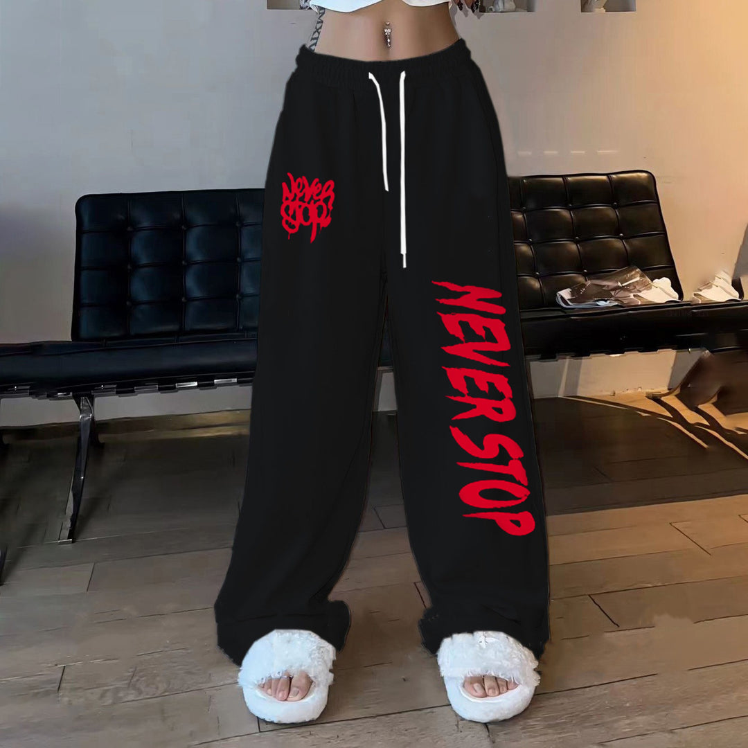 Women's casual pants in a relaxed oversized style with eye-catching graphic print Chic & Stil