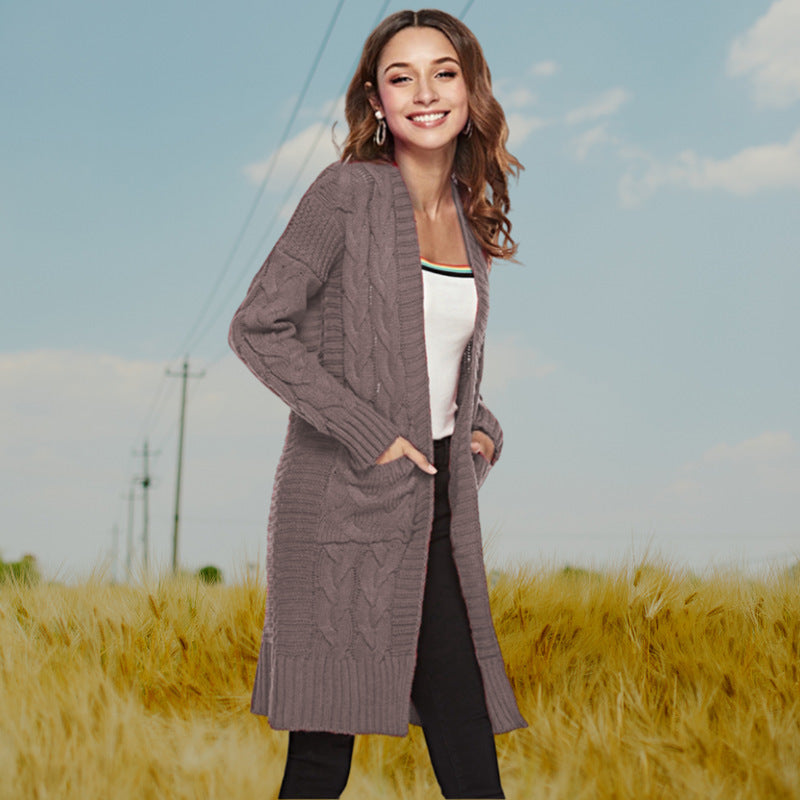 Knitted cardigan for women with a modern weaving pattern and practical pockets Lune London
