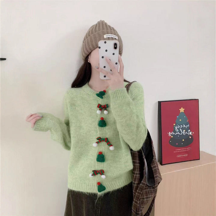 Cardigan pour femmes avec des appliqués festifs et des détails de boutons Chic & Stil