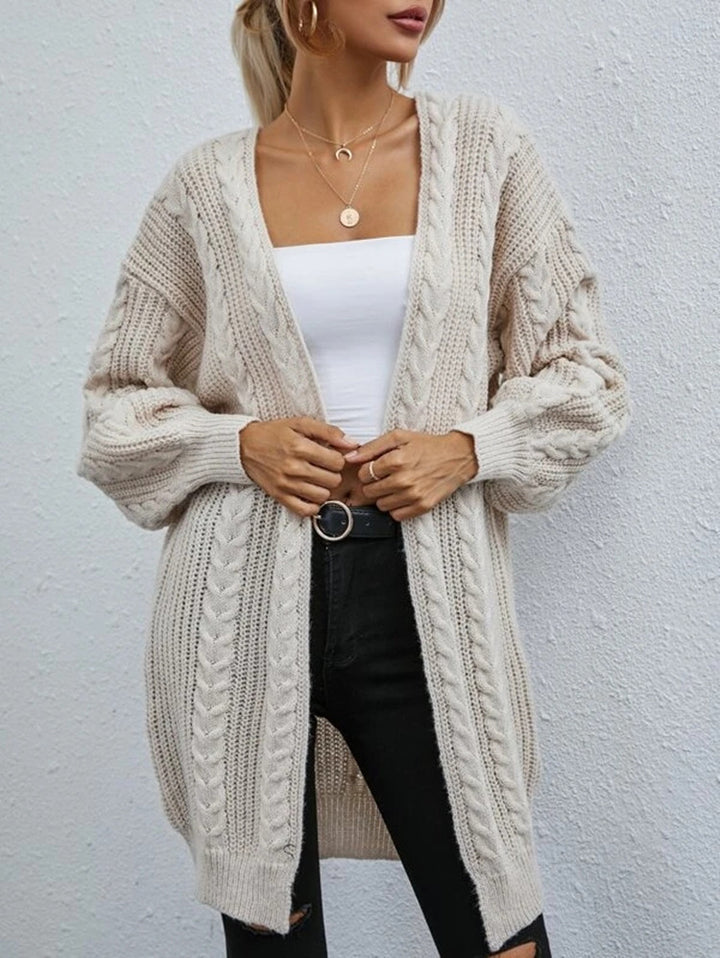 Thick knitted cardigan for women with a relaxed oversized fit and a refined cable pattern Lune London