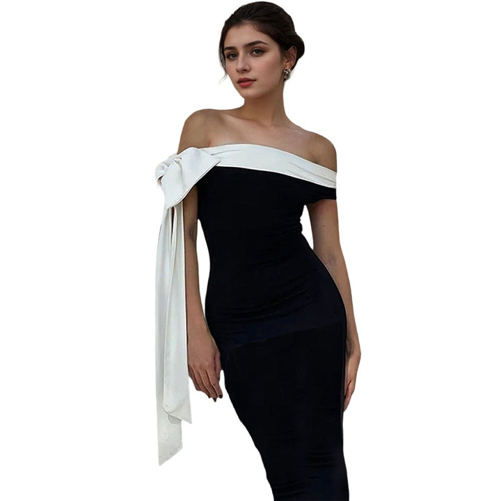 Robe Maxi Femme avec un design chic à épaules nues et un accent élégant en nœud Chic & Stil